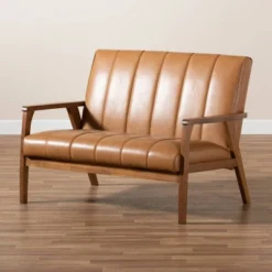 Nikko Mid-Century Faux Leather Upholstered Wood Loveseat Walnut/Brown - Baxton Studio 13 Nikko Mid-Century Faux Leather Upholstered Wood Loveseat Walnut/Brown - Baxton Studio -Baxton Studio GUEST 523a5df4 2552 4576 a2e6 22ac3329118d