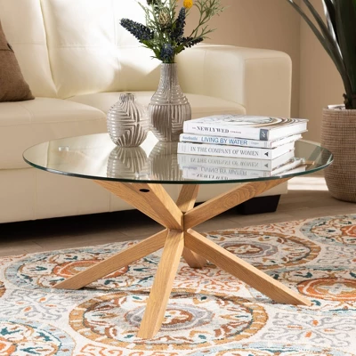 Lida Glass And Wood Finished Coffee Table Clear/Natural - Baxton Studio: Mid-Century Modern, 4 Point Leg Frame 2 Lida Glass And Wood Finished Coffee Table Clear/Natural - Baxton Studio: Mid-Century Modern, 4 Point Leg Frame - Image 2